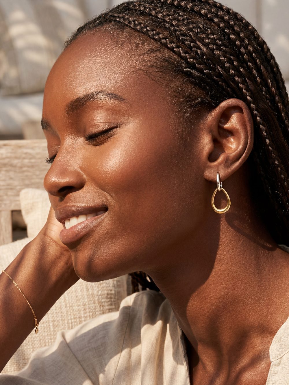 MUMREUES model wearing earrings