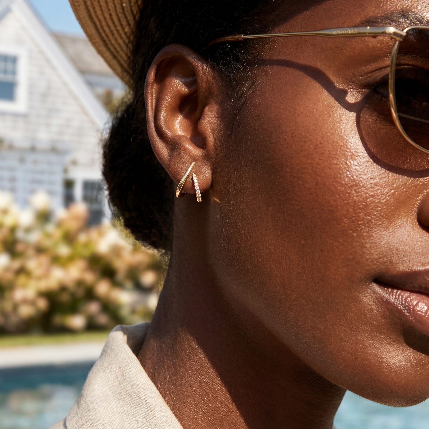 MUMREUES gold earrings worn on model